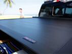 Load image into Gallery viewer, Roll-N-Lock E-Series Retractable Truck Bed Cover for 08-16 Superdutys